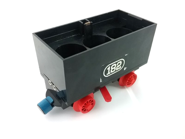 Lego Train Battery Box Car with Two Contact Holes, Red Switch Lever, Blue and Red Magnets, and Red Wheels with '182' Pattern on Both Sides (Stickers) - Set 182