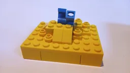 Minifigure buried in sand