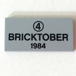Tile 2 x 4 with Black '4' in Circle and 'BRICKTOBER 1984' Print / Light Bluish Gray
