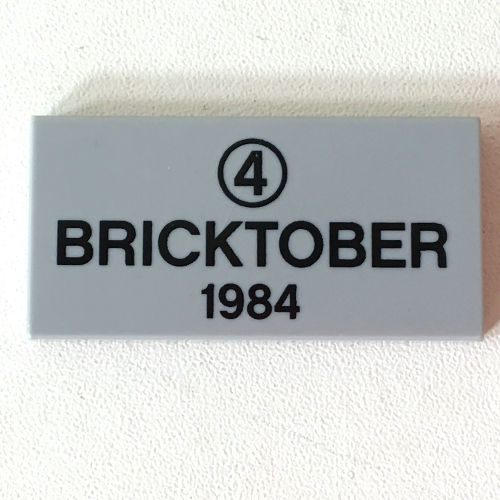 Lego Tile 2 x 4 with Black '4' in Circle and 'BRICKTOBER 1984' Print / Light Bluish Gray
