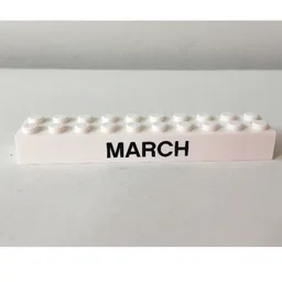 Brick 2 x 10 with Black 'MARCH' / 'APRIL' Print