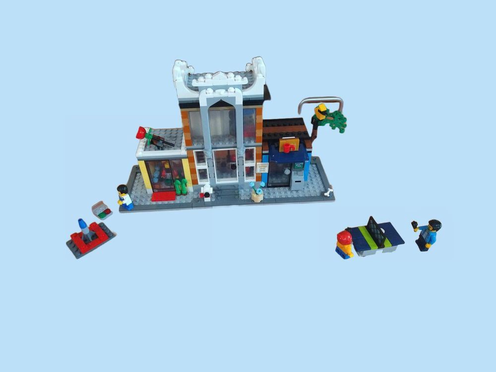 Lego Police station, flower shoppe, and cafe