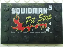 Tile, Modified 4 x 6 with Studs on Edges with 'SQUIDMAN's Pit Stop' Pattern (Sticker) - Set 5980