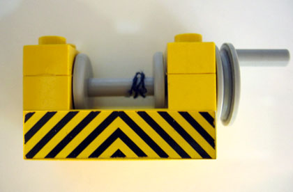 Lego String Reel Winch 2 x 4 x 2 with Light Gray Drum with Black and Yellow Danger Stripes Pattern (Sticker) - Set 6361