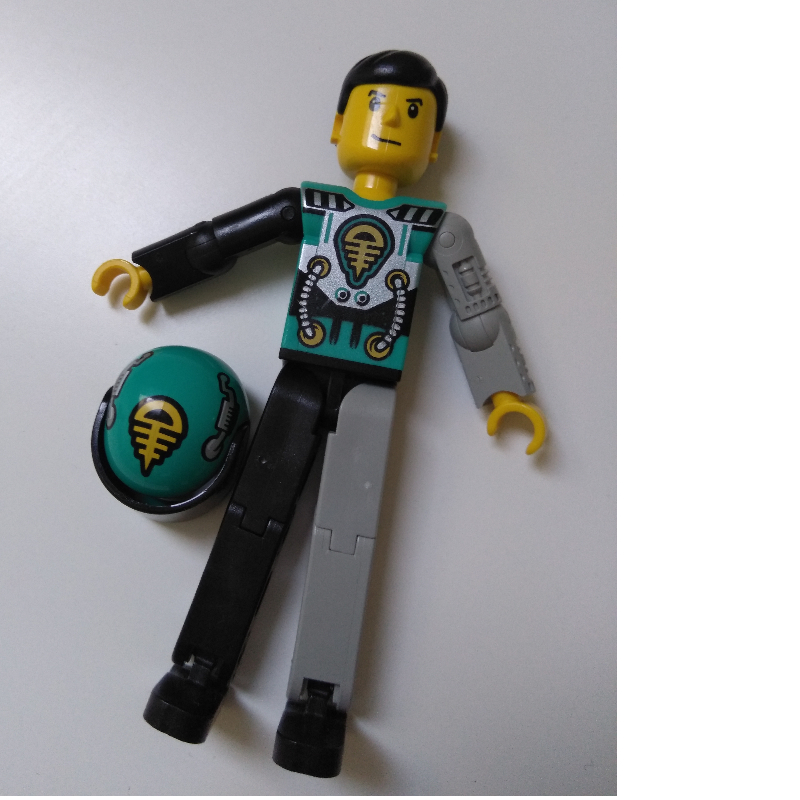 Lego Technic Figure Black/Light Gray Legs, Dark Turquoise Torso with Yellow, Black, Silver Print, Light Gray Mechanical Left Arm - Printed Helmet