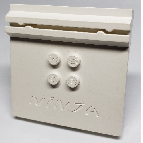 Lego Plate Special 6 x 6 x 2/3 with 4 Studs and Embossed 'Ninja' / White