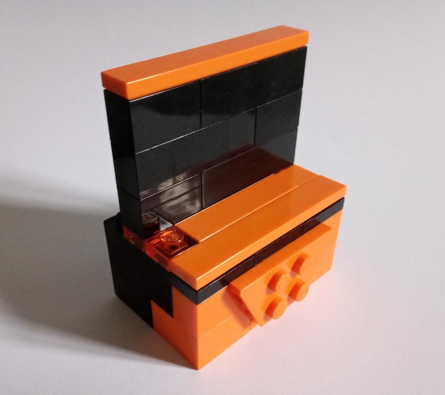 Lego Flat screen TV on orange/black table