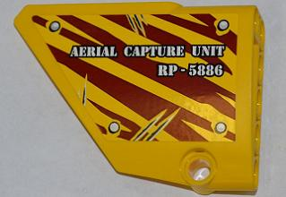 Lego Technic, Panel Fairing #13 Large Short Smooth, Side A with  'AERIAL CAPTURE UNIT RP-5886' on Dark Red Tiger Stripes Pattern (Sticker) - Set 5886
