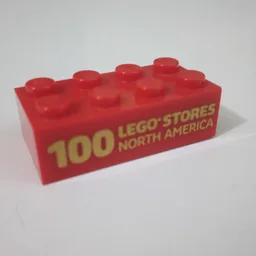 Brick 2 x 4 with '100 LEGO Stores North America' Print / Red
