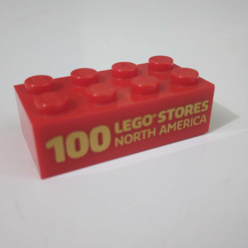 Lego Brick 2 x 4 with '100 LEGO Stores North America' print / Red