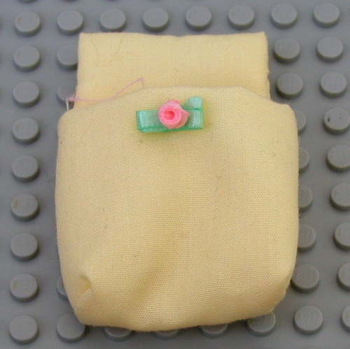 Lego Belville, Sleeping Bag / Baby Pouch with Green and Pink Floral Bow / Light Yellow