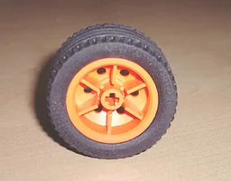 Wheel 30.4mm D. x 20mm with No Pin Holes with Black Tire 43.2 x 22 ZR (54087 / 44309) / Orange