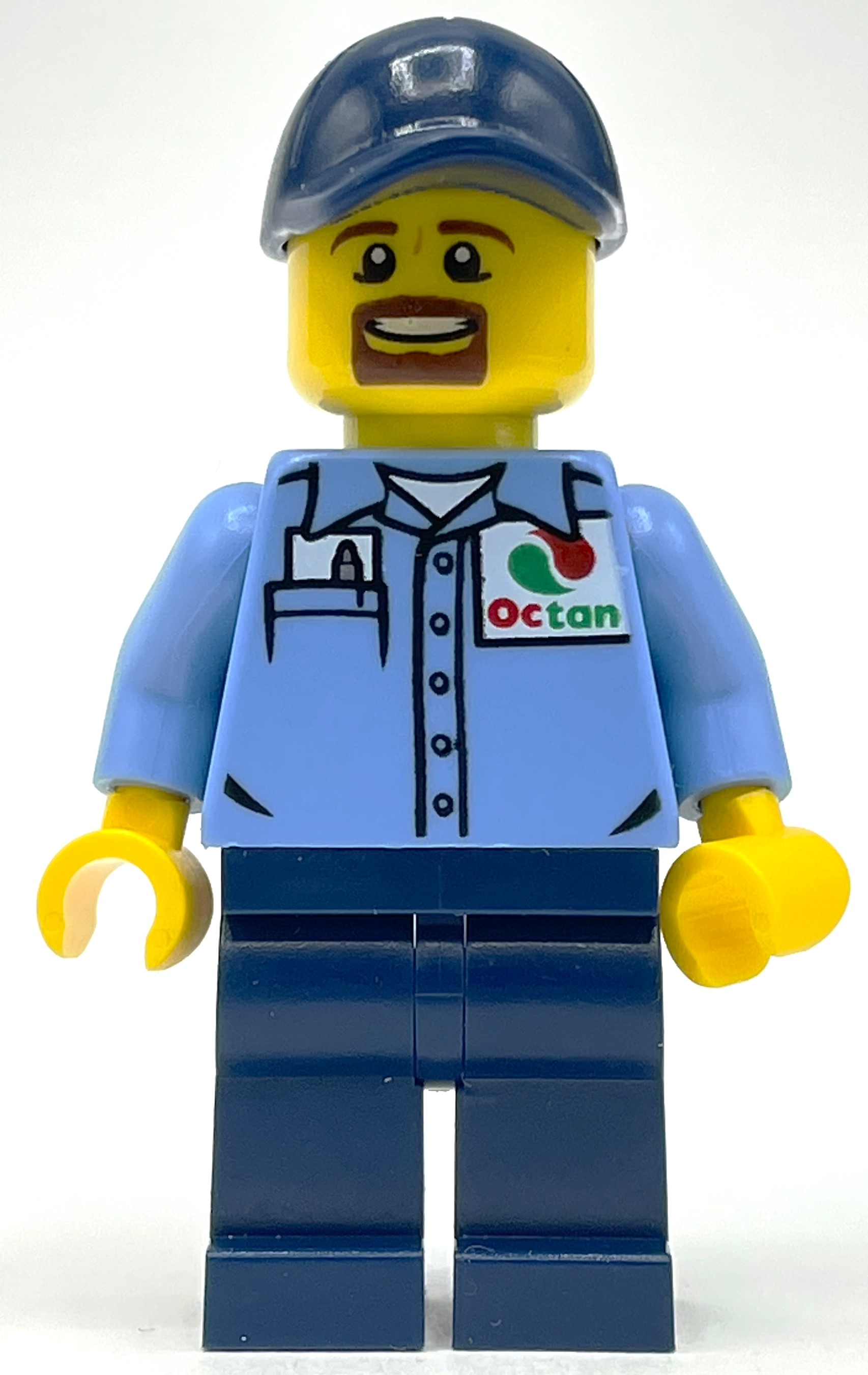 Lego Man, Medium Blue Shirt with Octan Logo, Dark Blue Legs, Dark Blue Cap, Goatee Beard