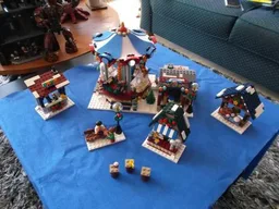 Winter village market with motorized carousel