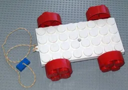 Jumbo Brick Vehicle Base 4 x 8 with Red Wheels