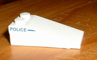 Lego Slope 18 4 x 2 with 'POLICE' Left of Line Pattern (Sticker) - Set 1376