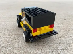 76897 Yellow Jeep Wrangler