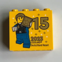 Brick 2 x 4 x 3 with 'LEGOLAND Deutschland Resort 15 2023', Police Officer (Besuchsmeister Gold) Print / Yellow