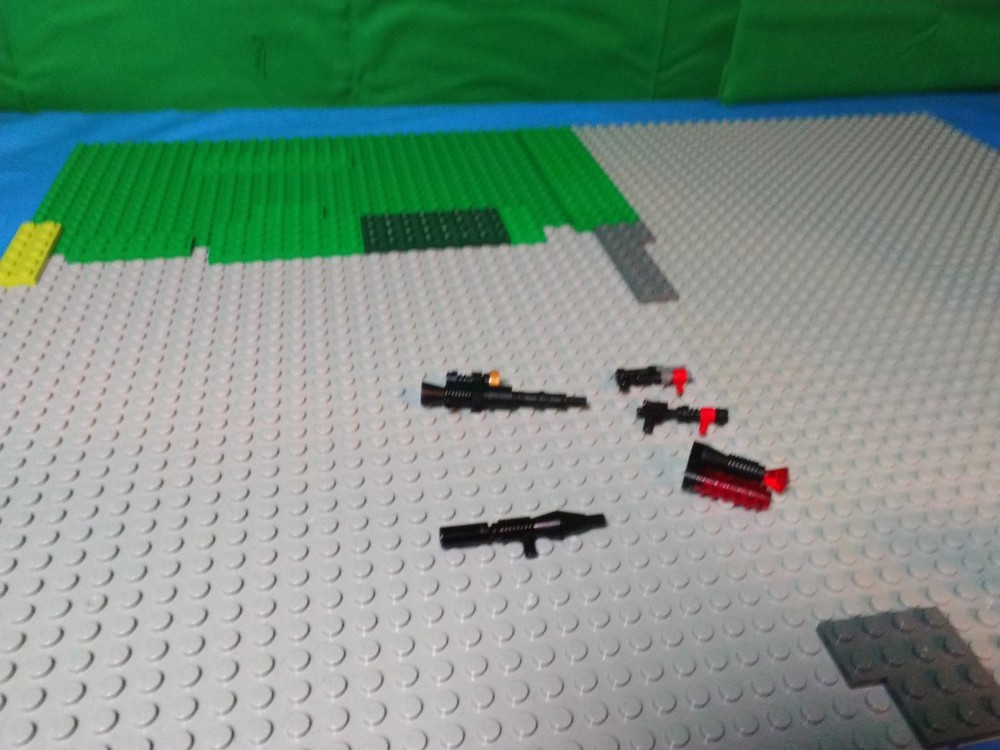 Lego Minifig weapons. (Minifig not included.)