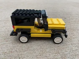 76897 Yellow Jeep Wrangler