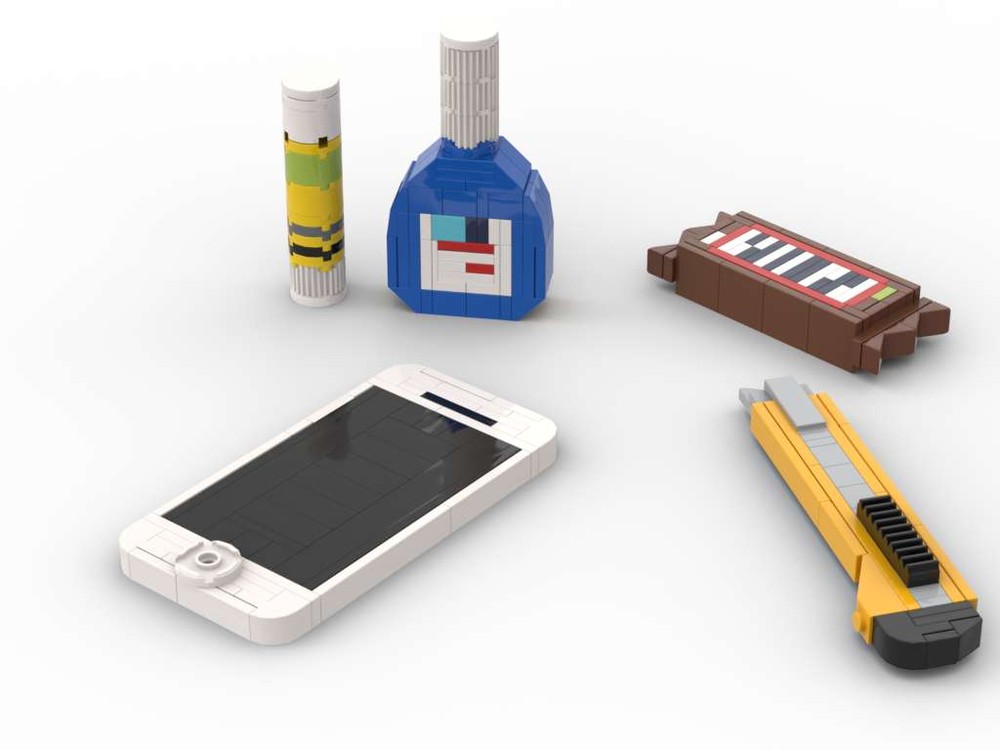 Lego IPhone, Glue Stick, Whiteout, Box cutter & snickers!!!