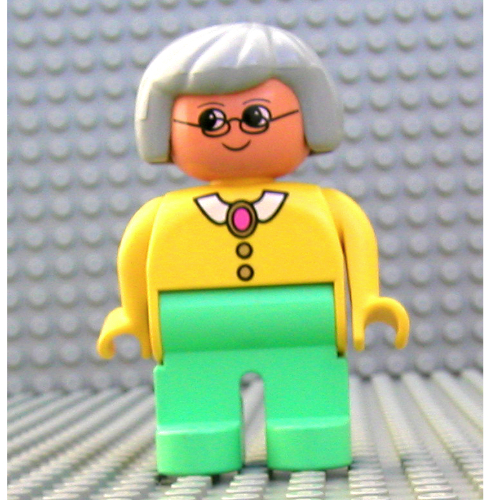 Lego Duplo Figure, Early, Hair Bob Light Gray, Medium Green Legs, White Collar and Pink Pendant, Glasses Print / Yellow