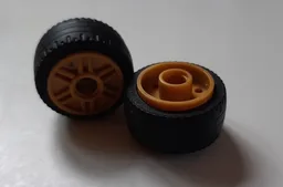 Wheel 18mm D. x 14mm with Pin Hole, Fake Bolts and Shallow Spokes with Black Tire 24 x 12 Low (55981 / 18977) / Pearl Gold