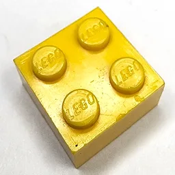 Brick 2 x 2 without Inside Support or Tubes / Yellow