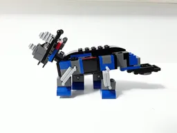 31054(x2) - Triceratops
