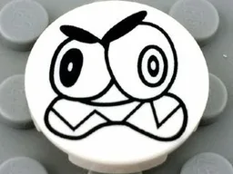 Tile, Round 2 x 2 with Bottom Stud Holder with Black Large Eyes and Scowl with Sharp Teeth (Nixel Face) Pattern
