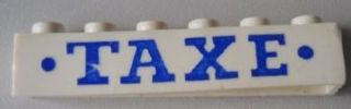 Lego Brick 1 x 6 without Bottom Tubes with Cross Side Supports with Blue 'TAXE' Serif Bold Large and Dots Pattern