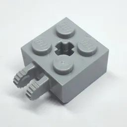 Hinge Brick 2 x 2 Locking with 2 Fingers Vertical and '+' Axle Hole, 9 Teeth / Light Bluish Gray