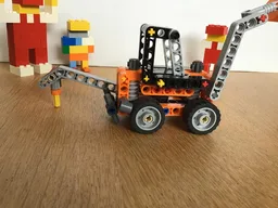 Backhoe With Auger
