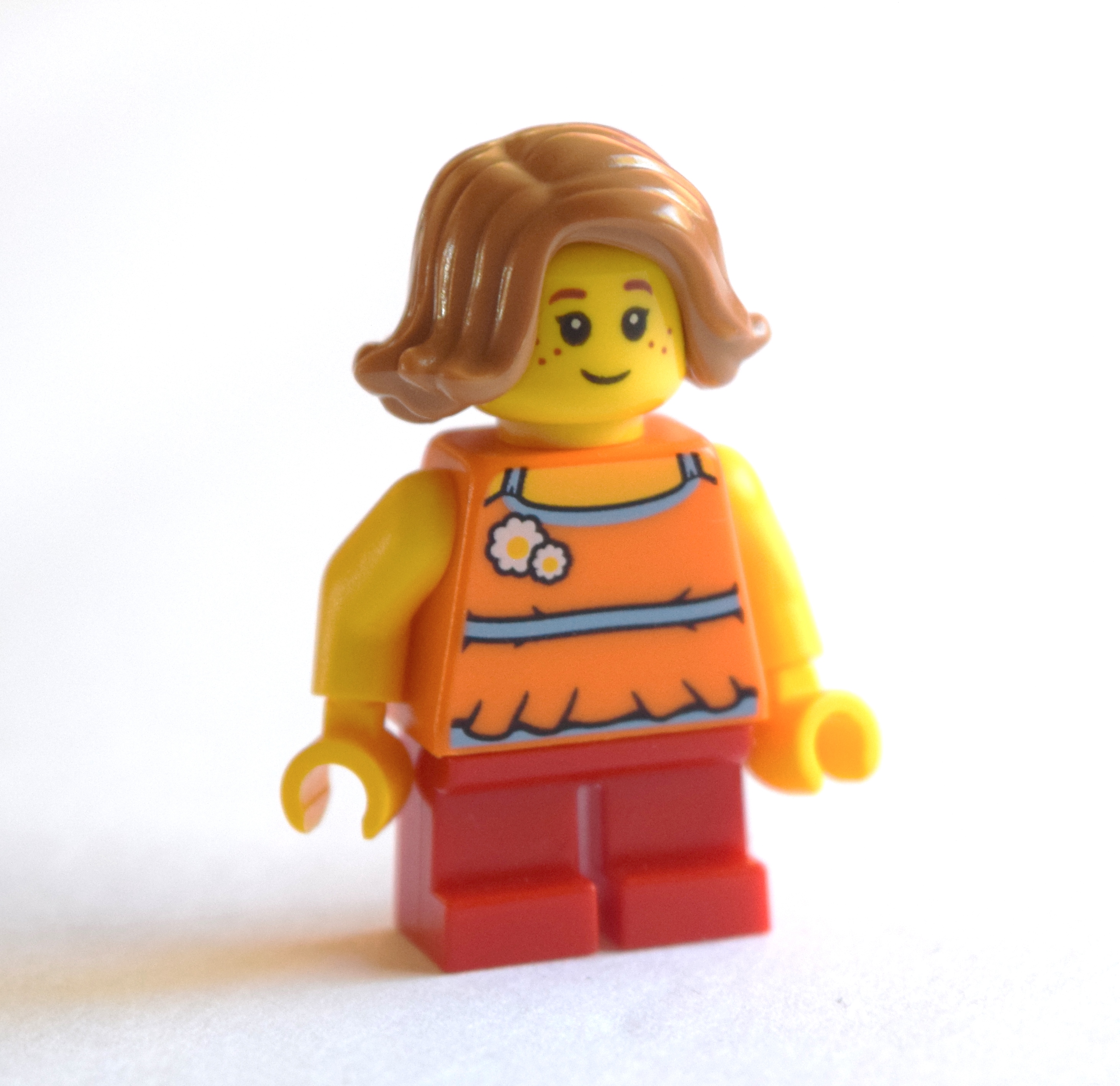 Lego Girl, Orange Top, Short Red Legs, Medium Nougat