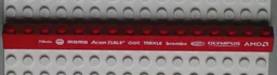 Brick 1 x 16 with White 'Beta', 'NGK', 'MOMO', 'ACER', 'SKF', 'MAHLE', 'brembo', 'MAGNETI MARELLI', 'OLYMPUS' and 'AMD' Pattern (Sticker) - Set 8654