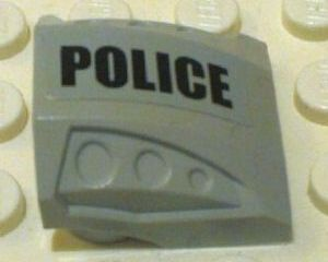 Lego Slope, Curved 2 x 2 with Debossed Side Ports with Black 'POLICE' Pattern Model Left Side (Sticker) - Set 7899