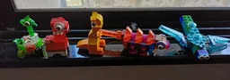 11013 Dinosaur pink-orange