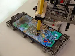 Robot to automate task in a mobile app