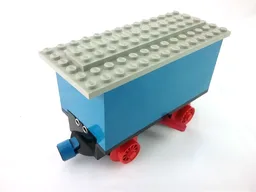 Train Battery Box Car with Two Contact Holes, Red Switch Lever, Blue and Red Magnets, Red Wheels, and Light Gray Roof