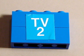 Lego Stickered Assembly 4 x 1 x 2 with White 'TV 2' on Blue Background Pattern (Sticker) - Set 664-1