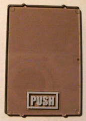 Lego Glass for Window 1 x 4 x 5 with White 'PUSH' in Rectangle Pattern (Sticker) - Set 4513 / Trans-Brown