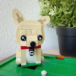 Pomchi puppy on pool table