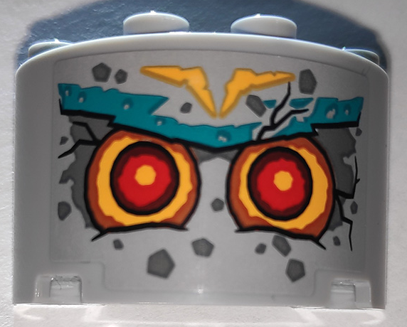 Lego Cylinder Half 2 x 4 x 2 with 1 x 2 Cutout with Stone Face with Red Eyes and Dark Turquoise Eyebrows Pattern (Sticker) - Set 71747