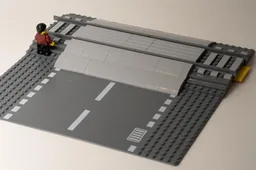 Railroad crossing for road baseplate