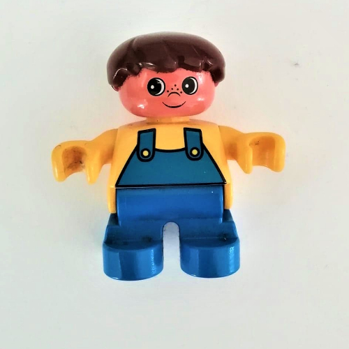 Lego Duplo Figure, Early Child, Hair Swept Left Brown, Blue Legs, Blue Overalls Print / Yellow