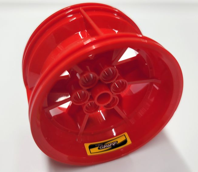 Lego Wheel 56mm D. x 34mm Technic Racing Medium, 6 Pin Holes with Yellow 'FIRM GRIPP' Pattern (Sticker) - Set 42077