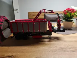 Dump trailer with crane