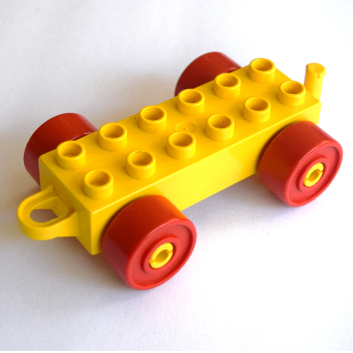 Lego Duplo Car Base 2 x 6 with Red Wheels and Old Style Closed Hitch End / Yellow