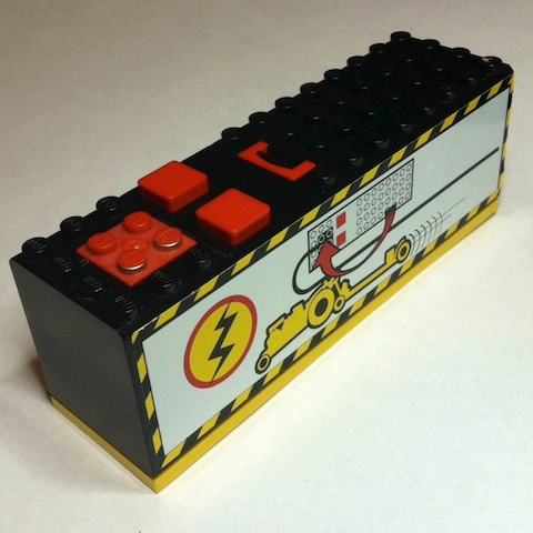 Lego Electric 9V Battery Box 4 x 14 x 4 with Red Buttons and Contact Plate with Yellow Base with Power Puller Pattern (Sticker) - Set 8457