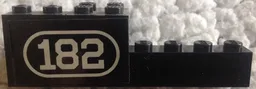 Stickered Assembly 8 x 2 x 2 with White Number 182 with Border on Black Background Pattern Model Left Side (Sticker) - Set 182